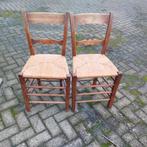 rieten antieke stoel, Ophalen