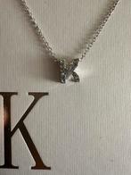 Nieuw: zilverkleurige ketting met letter hanger, Overige materialen, Met strass, Nieuw, Ophalen of Verzenden