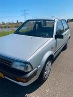 Toyota Starlet 1.3 DX 12V AUT 1986 Grijs, Auto's, 74 pk, 4 cilinders, Starlet, Overige bekleding