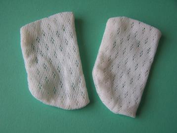 Oude poppensokjes beschikbaar voor biedingen