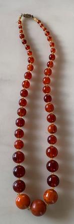 Oude ketting met draaislot (bakeliet?), Sieraden, Tassen en Uiterlijk, Kettingen, Ophalen of Verzenden, Zo goed als nieuw, Overige materialen