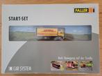 Faller DHL vrachtauto en trafo uit startset 161607, Ophalen of Verzenden, Gelijkstroom of Wisselstroom, Overige merken