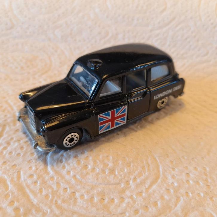 Matchbox Austin London taxi Metal base/opening doors., Hobby en Vrije tijd, Modelauto's | Overige schalen, Zo goed als nieuw, Auto