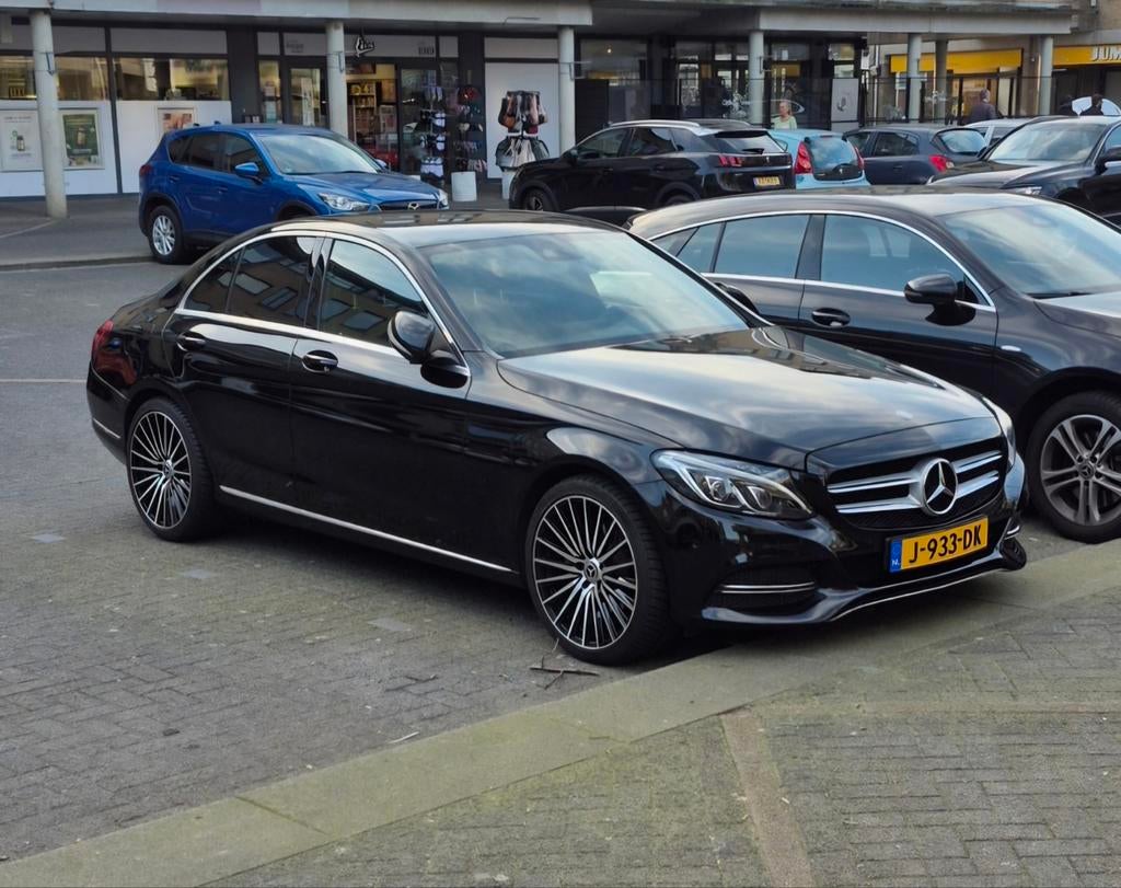 Mercedes-Benz C-Klasse C200 2.0 135KW Aut7 2014 Zwart, Auto's, Mercedes-Benz, 1800 kg, Zwart, 4 cilinders, Leder en Stof