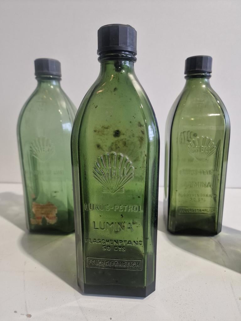 Shell glazen oilie fles  met  bakelite dop, Verzamelen, Ophalen, Gebruikt, Verpakking