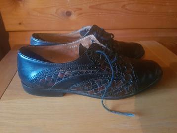 Zwart met bruin leren herenschoenen - maat 43

 beschikbaar voor biedingen