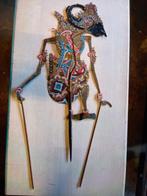 Wayang Kulit schaduw pop, Ophalen