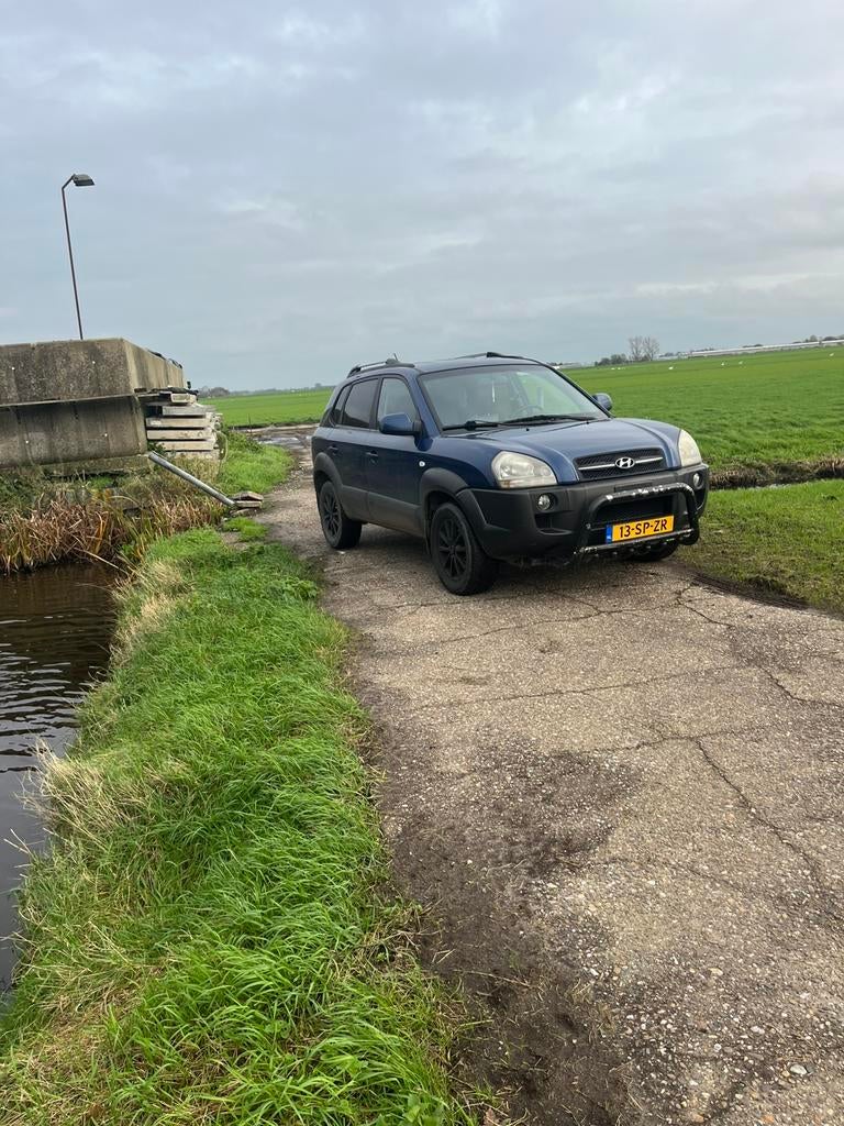 Hyundai Tucson 2.0 I 2WD 2006 Blauw, Auto's, Hyundai, 74 €/maand, 4 cilinders, Blauw, Origineel Nederlands