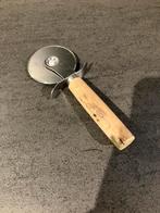 Pizza snijder, Ophalen, Nieuw