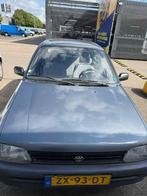 Toyota Starlet 1.3 XLI U9 1991 Grijs, Auto's, 74 pk, 4 cilinders, Starlet, Origineel Nederlands
