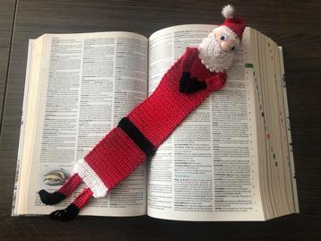 Boekenlegger kerstman beschikbaar voor biedingen