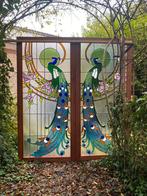 glas in loodramen met pauwen, Ophalen