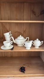 Crème kleur theeservies, Ophalen