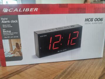 Digitale wekker Caliber HCG006 beschikbaar voor biedingen