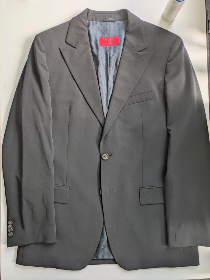 NIEUW Tweedelig Hugo Boss pak, Kleding | Heren, Kostuums en Colberts, Zo goed als nieuw, Maat 52/54 (L), Grijs, Ophalen of Verzenden