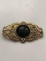 Goudkleurige broche met zwarte glassteen en kleine steentjes, Overige materialen, 4 tot 7 cm, Gebruikt, Ophalen of Verzenden