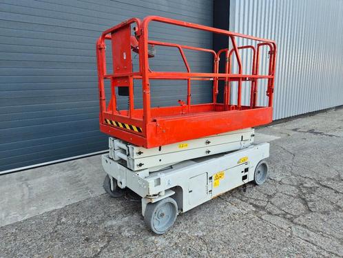 Genie Genie 2046 Schaarlift / Elektrische hoogwerker, Zakelijke goederen, Machines en Bouw | Liften, Steigers en Ladders