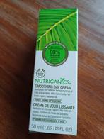 The Body Shop Nutriganics Smoothing Day Cream, Sieraden, Tassen en Uiterlijk, Uiterlijk | Parfum, Verzenden, Nieuw
