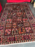 Perzisch tapijt - rode tinten met ondertapijt, Huis en Inrichting, Stoffering | Tapijten en Kleden, Zo goed als nieuw, Ophalen