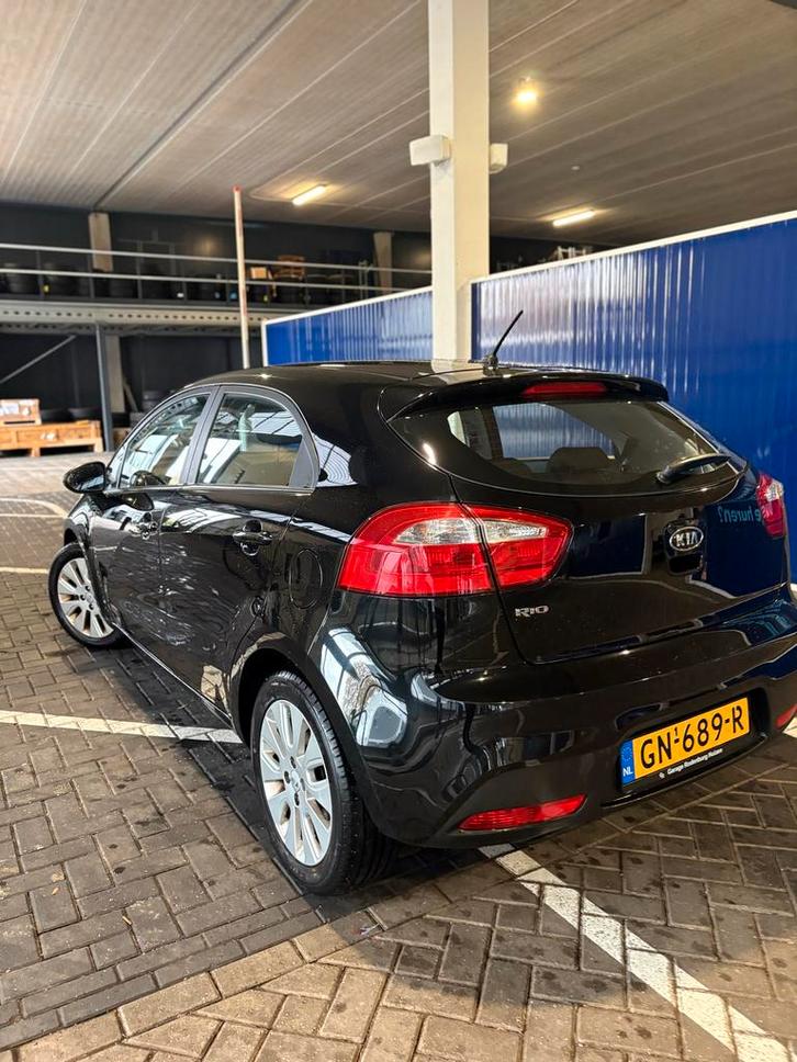 Kia Rio 1.4 2012 Zwart, Auto's, Kia, Particulier, Rio, ABS, Airbags, Airconditioning, Centrale vergrendeling, Elektrische ramen