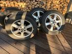 Winterbanden Hankook op originele Audi velgen, Ophalen, Gebruikt, 16 inch, Banden en Velgen