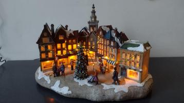 2 kerstdorpjes met verlichting beschikbaar voor biedingen