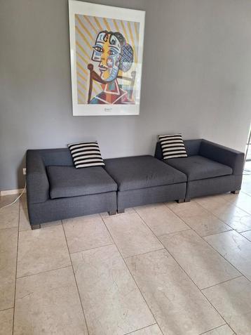 Donkergrijze Minotti designbank - 2 fauteuils & 1 hocker beschikbaar voor biedingen