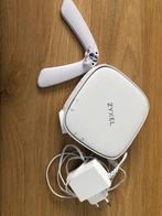 Zyxel WX5600 wifi versterker, Computers en Software, Routers en Modems, Ophalen of Verzenden, Zo goed als nieuw