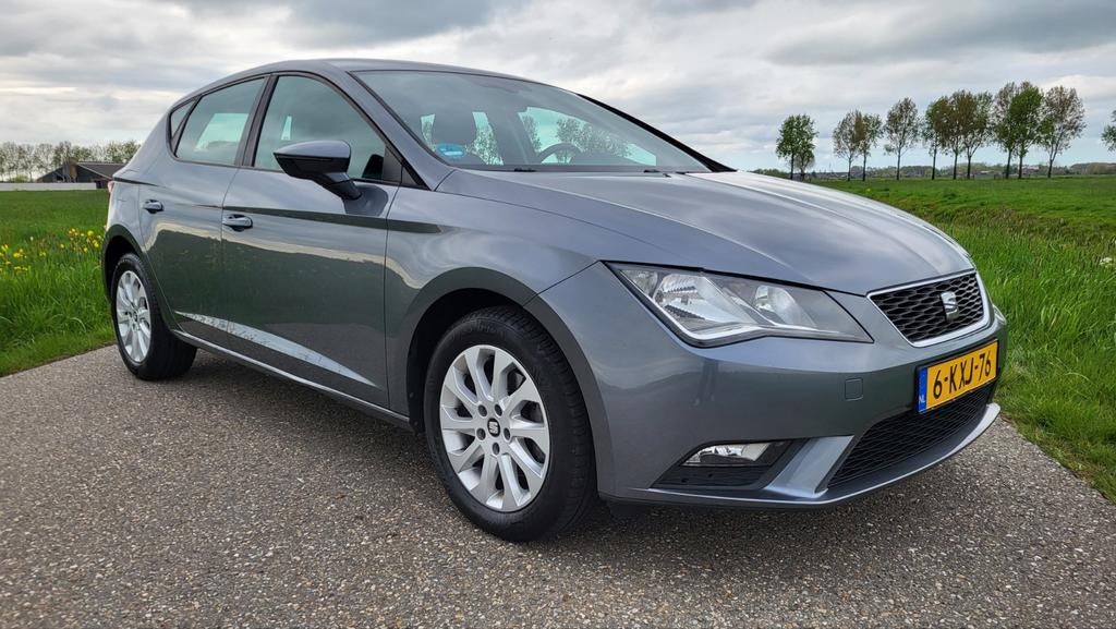 Seat Leon 1.2 TSI 105PK 2013 Airco Lm Navi Cruise, Auto's, Seat, Voorwielaandrijving, Euro 5, Stof, Zwart