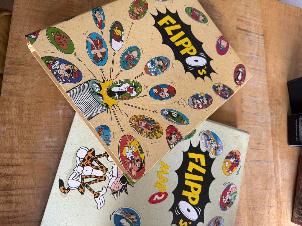 Complete Flippo collectie - mist 1 flippo (243A), Ophalen of Verzenden, Chester Cheetos, Verzameling, Met verzamelmap(pen)