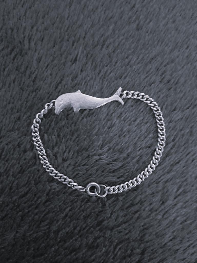 Armbandje Dolfijn zilverkleurig. Voor kind, Ophalen of Verzenden, Zo goed als nieuw, Zilver, Armband