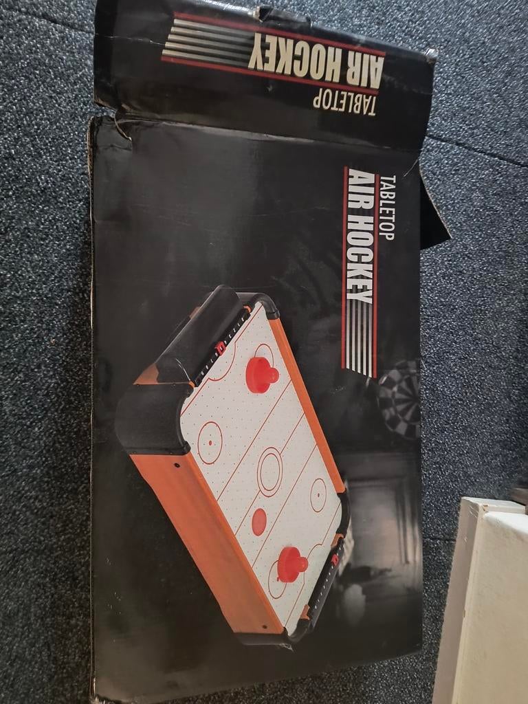 Tabletop air hockey, Ophalen