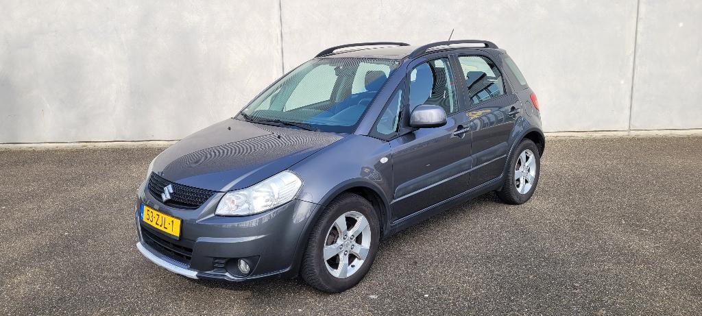 Suzuki SX4 1.6 2009 Grijs Suzuki SX4, Auto's, Suzuki, Voorwielaandrijving, Stof, 4 cilinders, SX4