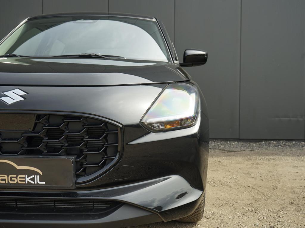 Suzuki Swift 1.2 DUALJET HYBRID Club Dealeronderh / Startkno, Auto's, Stof, Gebruikt, Zwart, 4 cilinders