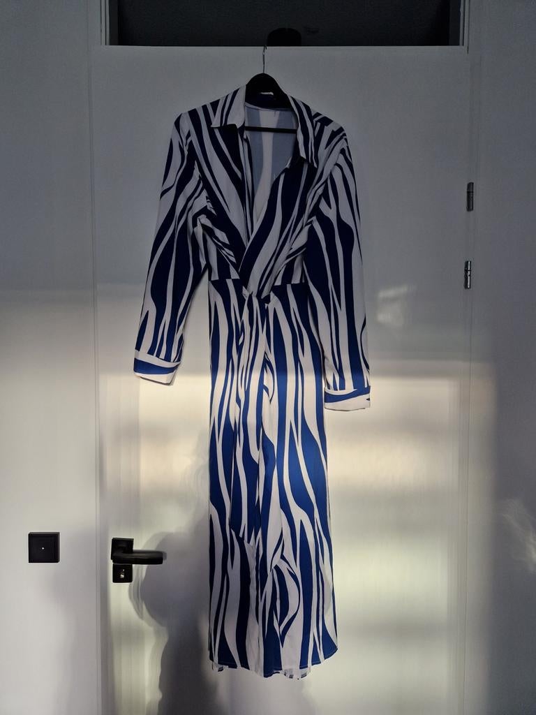 Mooie middellange wikkeljurk maat xl, Blauw, Maat 46/48 (XL) of groter, Ophalen of Verzenden, Onder de knie