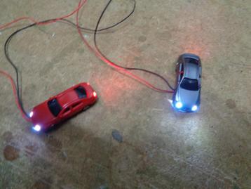 Te koop 2 nieuwe N spoor auto,s met Led verlichting 12 volt beschikbaar voor biedingen
