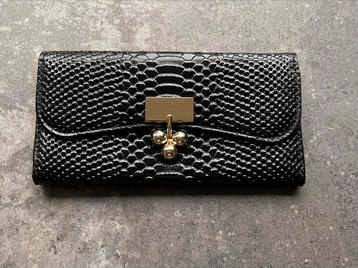 Elegante zwarte clutch beschikbaar voor biedingen