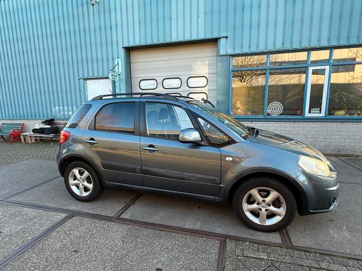 Suzuki SX4 1.6 2007 Grijs 104500km APK tot 04.2026, Auto's, Suzuki, Bedrijf, SX4, Benzine, D, Hatchback, Handgeschakeld, Origineel Nederlands