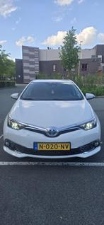 Toyota Auris 1.8 Hybrid 136pk Aut 2016 Wit, Auto's, Toyota, 65 €/maand, 136 pk, Zwart, 4 cilinders