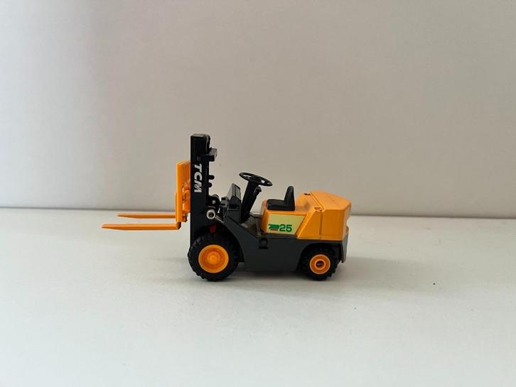 Heftruck van TCM, Hobby en Vrije tijd, Modelauto's | 1:50, Gebruikt, Hijskraan, Tractor of Landbouw, Overige merken, Ophalen of Verzenden