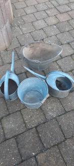 Zinken emmers en gieters, Ophalen