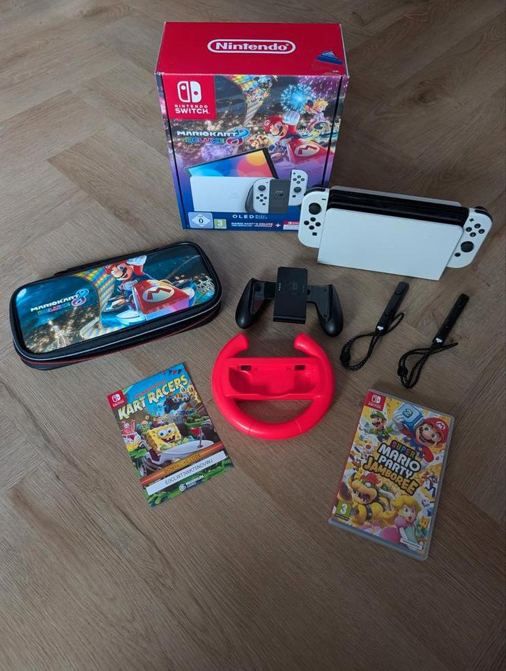 Switch OLED + Mario Kart 8 Deluxe + Mario party Jamboree, Spelcomputers en Games, Spelcomputers | Nintendo Switch, Zo goed als nieuw