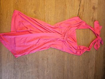 Mini jurk roze beschikbaar voor biedingen