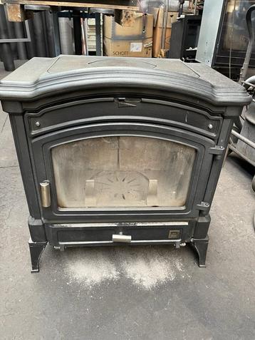 gebruikte houtkachel nestor martin 12kw  beschikbaar voor biedingen
