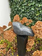 Beeldhouwwerk van belgische hardsteen, Ophalen