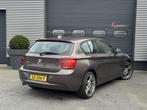 BMW 1-serie 116d High Executive | Lederen Bekleding | Naviga, Euro 5, 4 cilinders, Bruin, 116 pk