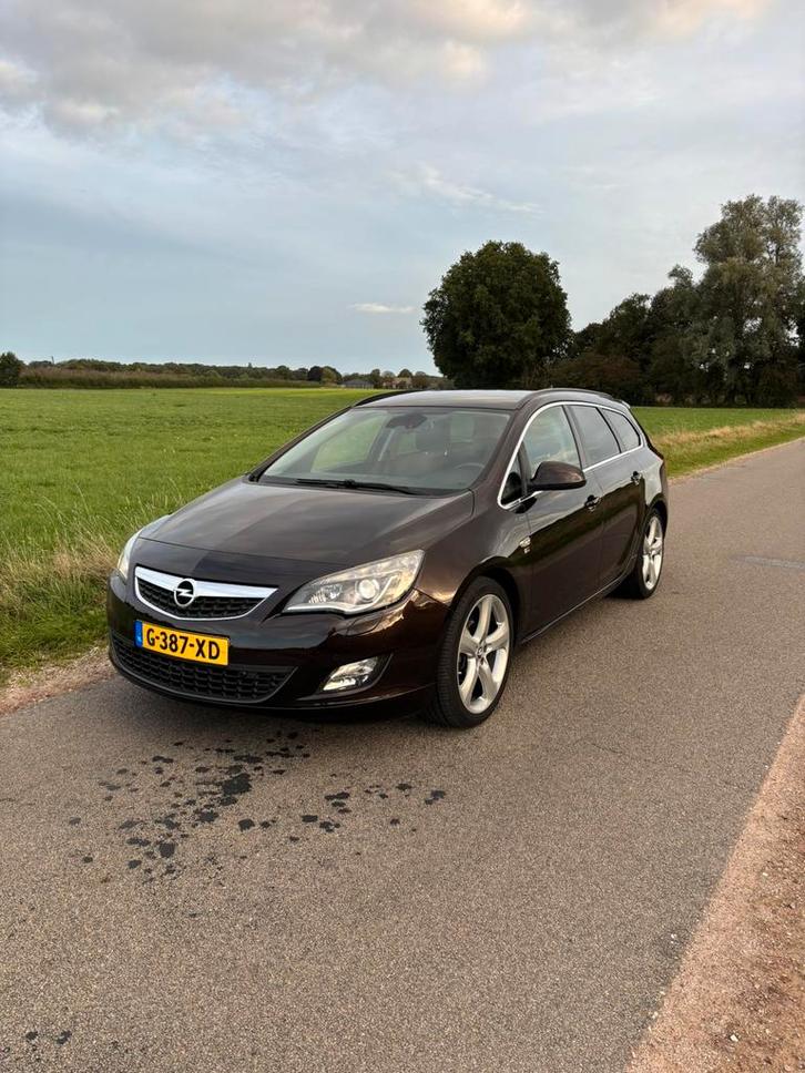 Opel Astra 1.4 Turbo 103KW Sports Tourer 2012 Bruin, Auto's, Opel, Bedrijf, Astra, ABS, Adaptieve lichten, Airbags, Airconditioning