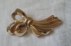 Broche in de vorm van een strik., Sieraden, Tassen en Uiterlijk, Broches, Ophalen of Verzenden, Zo goed als nieuw, Goud, Overige materialen