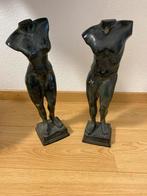 Twee torso beelden, Ophalen