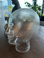 Retro glazen hoofd, Ophalen